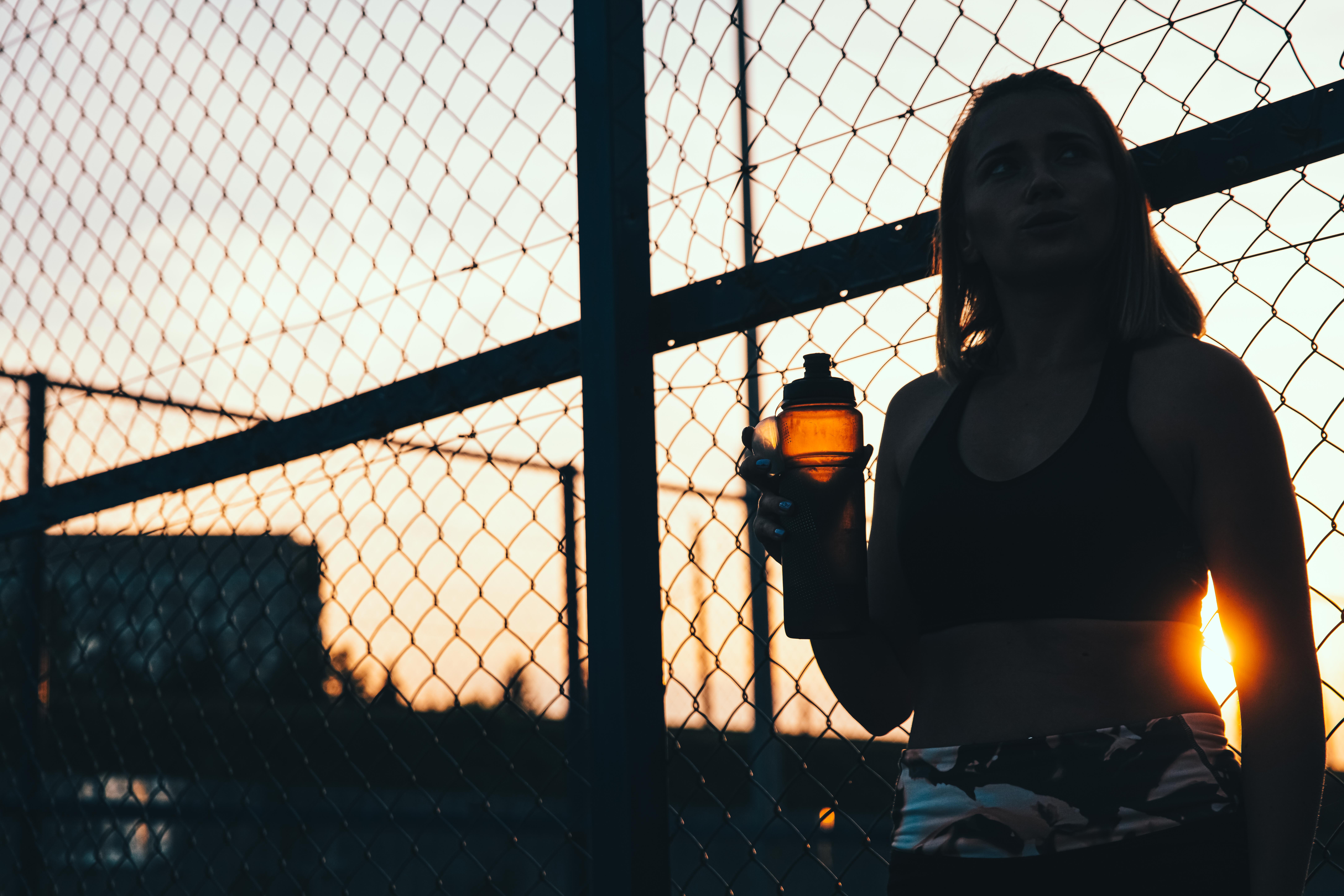 Silhouette of a person at sunset. Fall and Winter Sports Training.