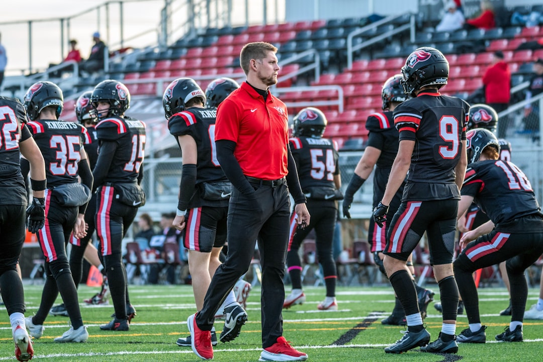 Special Olympics Kicks Off, World Cup Soccer Surge, Florida EKG Law, TeamSnap Hits $20M: 15 Must-Know Youth Athlete Development Stories (June 21, 2026) 2 youth athlete development - Coach watches football players on the field.
