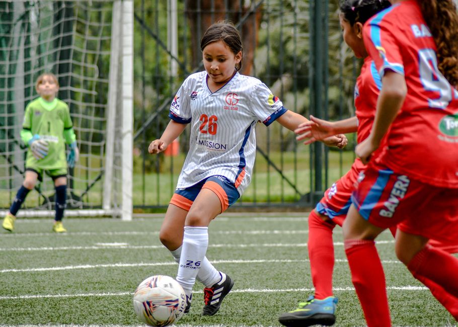 Boys Participation Hits 42%, Girls Gap Opens at 8, Overtime Lands Eldridge Raise, U.S. Bank Backs NFL FLAG: 15 Must-Know Youth Sports Stories (October 4, 2026) 1 youth sports news - Young soccer players in action during a competitive match outdoors.