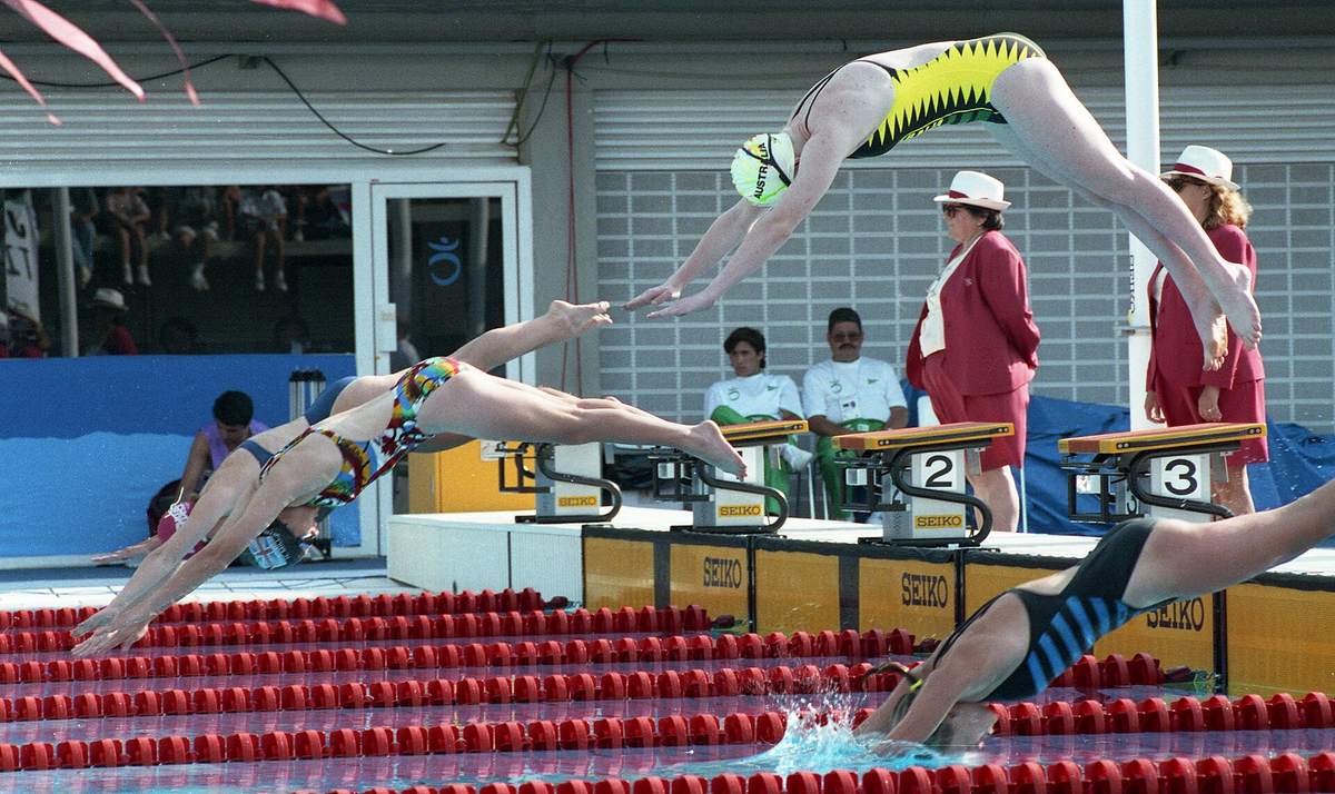 How to Do a Racing Dive Start Off the Blocks